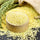 millet grains in a wooden bowl