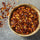 red chili flakes in a ceramic bowl