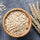 dry thick cut rolled oats in a wooden bowl